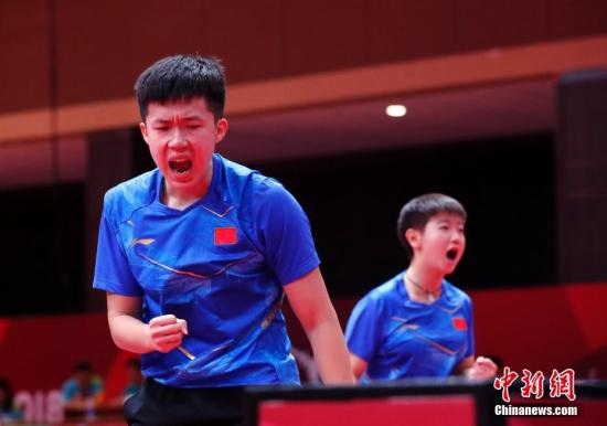 資料圖：雅加達(dá)亞運(yùn)會(huì)，王楚欽/孫穎莎奪得混雙冠軍。 <a target='_blank' href='/'>中新社</a>記者 劉關(guān)關(guān) 攝