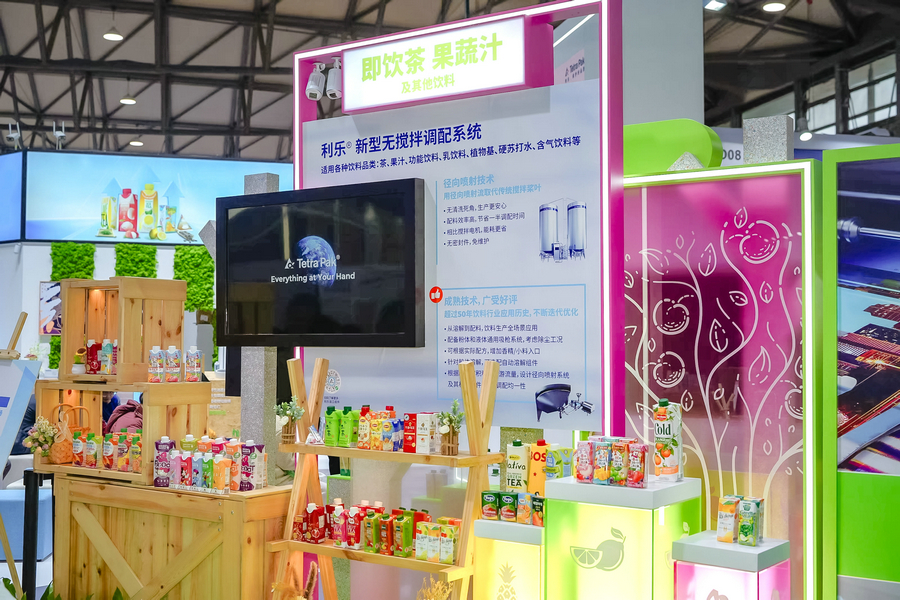 2. 利樂(lè)即飲茶、果蔬汁及其他飲料展臺(tái)展示利樂(lè)端到端解決方案.jpg