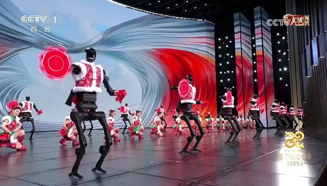 △今年春晚，宇樹科技人形機(jī)器人身穿東北特色的花棉襖扭秧歌，呈現(xiàn)出全新視覺效果。